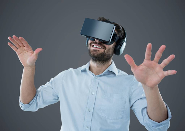 Man in virtual reality headset  - Фото, изображение