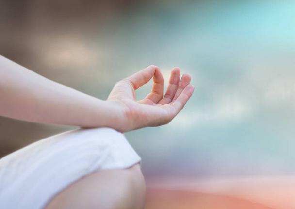 Hand and knee of meditating woman  - Foto, immagini