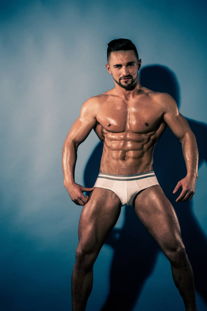 athlete with muscular body in underwear pants - Foto, Imagen