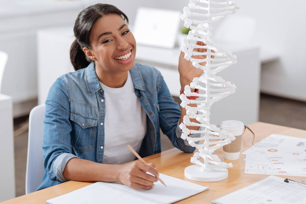 Happy nice student studying genetics - Photo, image