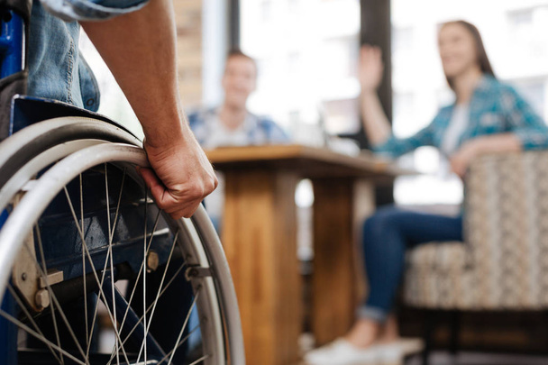 Confident handicapped man meeting his friends - Foto, immagini