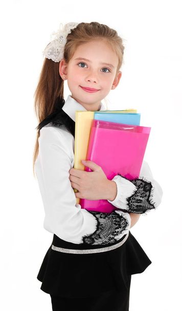 Portrait of happy smiling school girl child with books in unifor - Zdjęcie, obraz