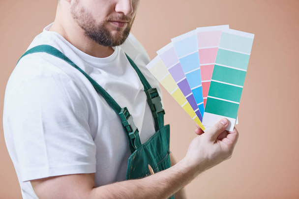 Painter with color palettes - Photo, image