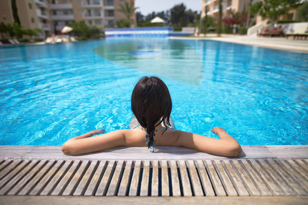 woman relaxing in swimming pool.  - Photo, Image