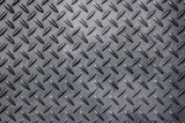 Placa de metal gris antideslizante con patrón de diamante
 - Foto, imagen