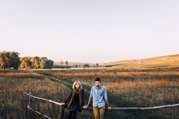 Couple on a walkin wheat field - Photo, Image