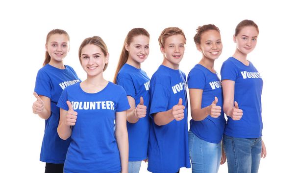 Group of young volunteers on white background - Fotó, kép