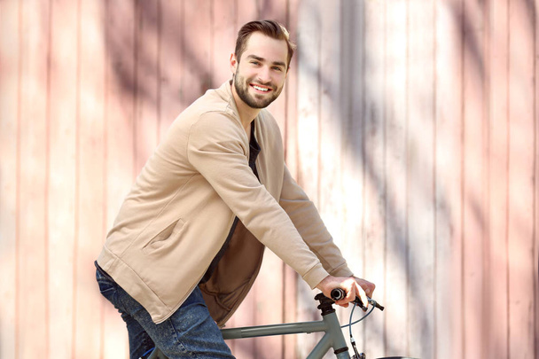 young man riding bicycle - Fotoğraf, Görsel