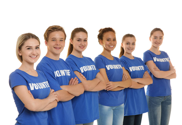 Group of young volunteers on white background - Foto, immagini