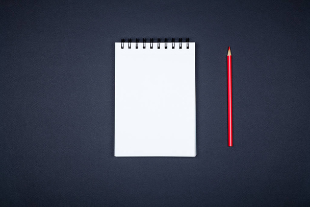Top view of open spiral blank notebook on colorful desk - Φωτογραφία, εικόνα