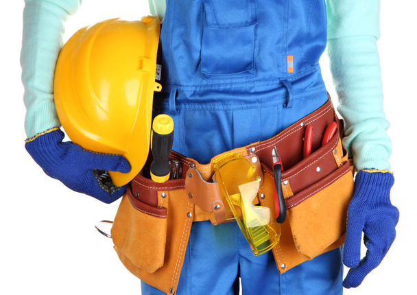 Male builder in blue overalls with yellow helmet isolated on white - Foto, Bild