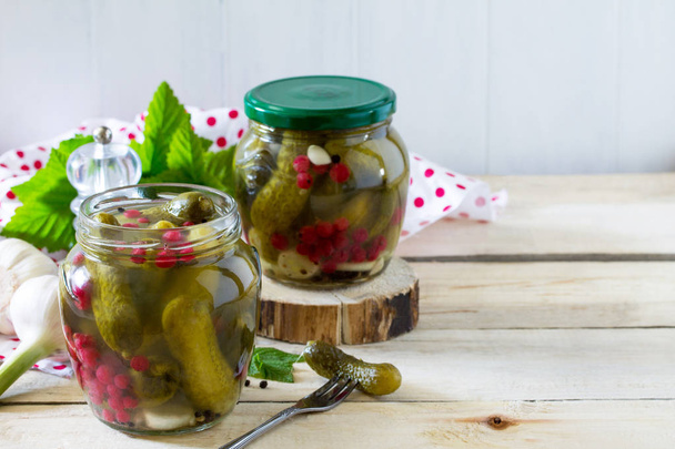 Marinated cucumbers gherkins. Marinated pickled cucumbers with r - Photo, Image