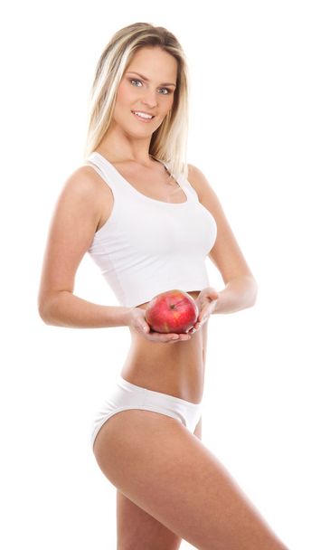 Young sexy girl with exotic fruit isolated on white - 写真・画像