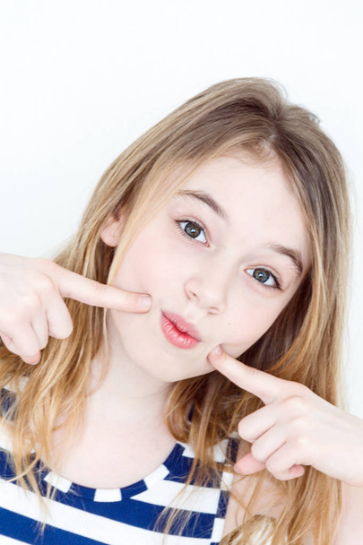 Portrait of playing girl eleven years old - Zdjęcie, obraz