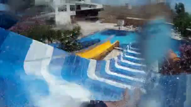 Man in the water park. Active rest, water park, water slides, action camera. - Footage, Video