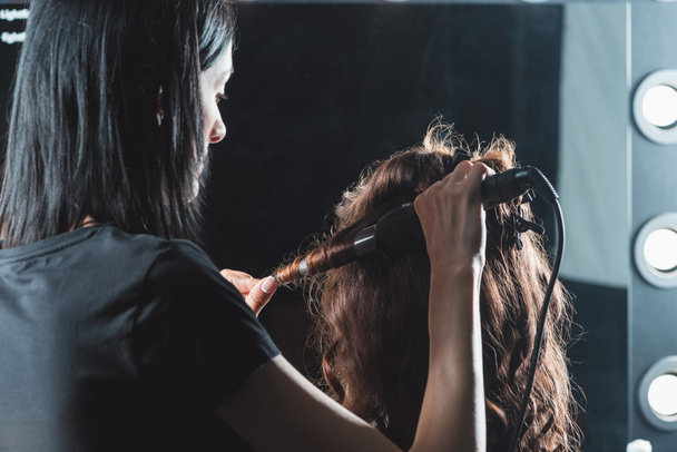 hair dresser doing hairstyle - Photo, Image