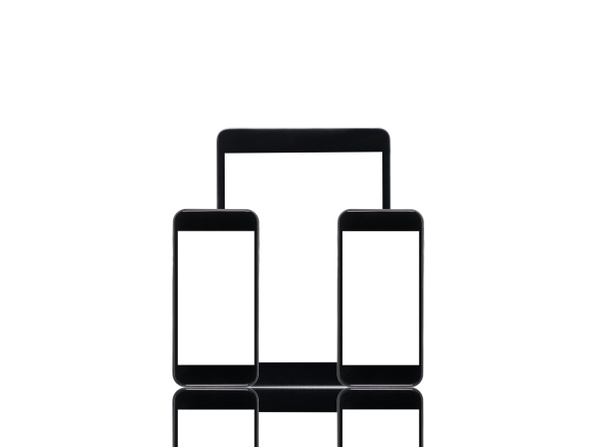 tablet digital e smartphones com telas em branco
 - Foto, Imagem