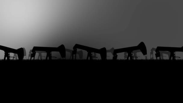Industrial Oil Pumps Silhouette in an Oil Field in a Polluted Environment - Footage, Video