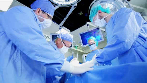 sebészek ortopédiai művelet végrehajtása - Felvétel, videó