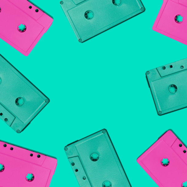 Audio cassettes on a turquoise background - Foto, Imagen