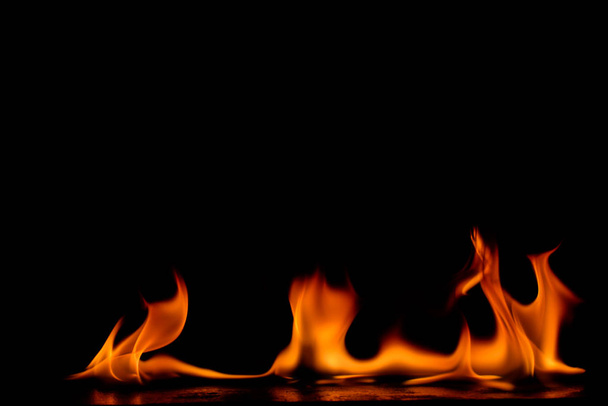 Beautiful fire flames on black background. - Foto, immagini