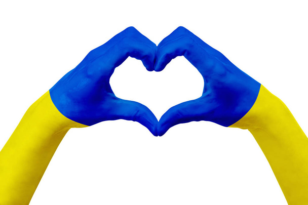 Hands flag of Ukraine, shape a heart. Concept of country symbol, isolated on white. - Fotoğraf, Görsel