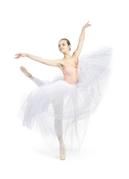 Young,smiling girl dancing the ballet. - Фото, изображение