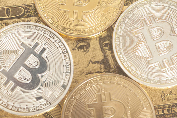 Golden  and silver bitcoin  with U.S. dollar - Photo, image