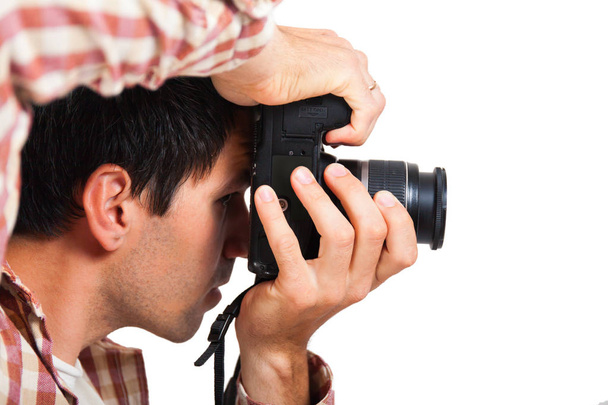 Fotografia uomo con fotocamera in mano
 - Foto, immagini