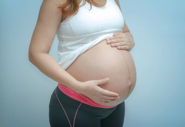 lähikuva söpö raskaana vatsa - Valokuva, kuva