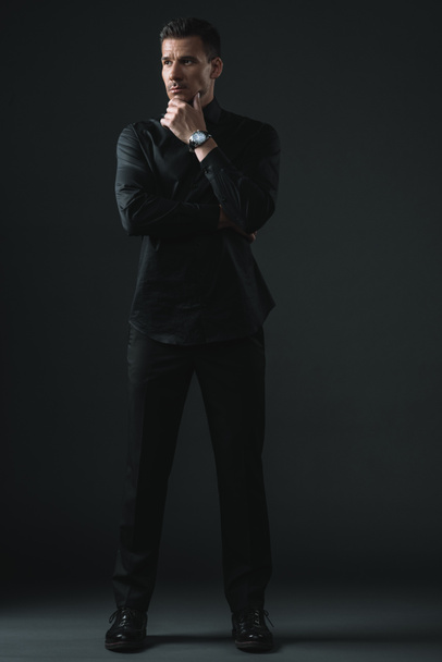 fashionable man in black outfit - Фото, зображення