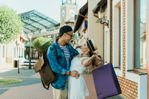 stylish couple with shopping bags - Photo, Image
