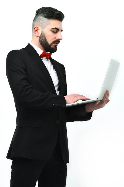 Concentrated businessman or executive director with red bow tie - Foto, Imagem