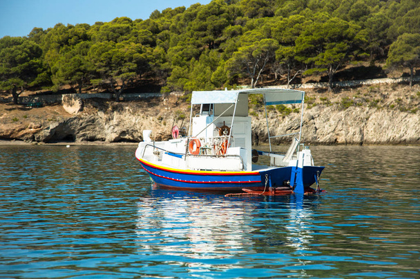 Boat in the bay in Assos village, Kefalonia island, Greece.  - Photo, Image