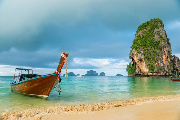 Beautiful wooden boat long tail off the coast of Thailand close- - Photo, Image