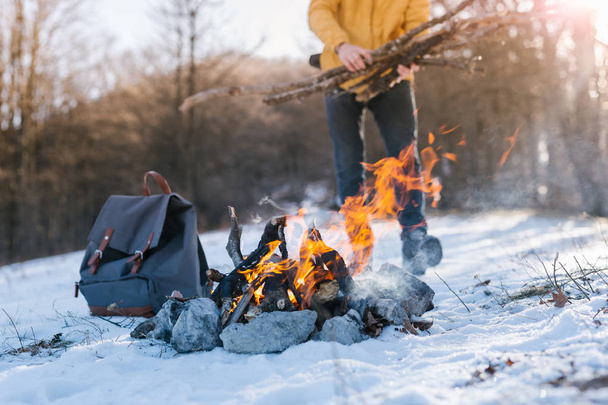 man near Bonfire on winter - Zdjęcie, obraz