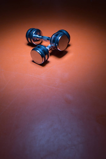 Close-up of dumbells on floor - Foto, Imagem