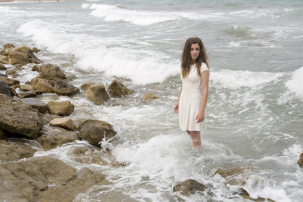Teenage girl in white dress - Fotoğraf, Görsel