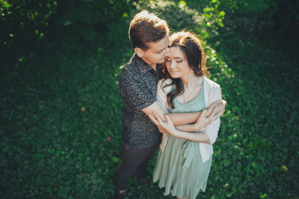 couple hugging posing in park - Photo, image