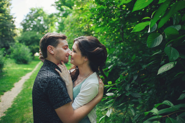  couple hugging and kissing outdoors - Photo, image