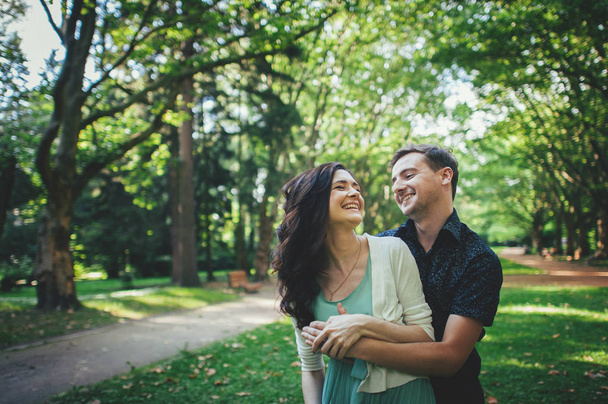 couple hugging posing in park - Photo, Image