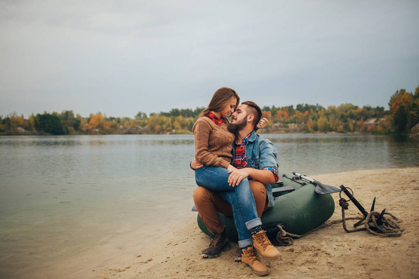 happy couple sitting on boat - Valokuva, kuva