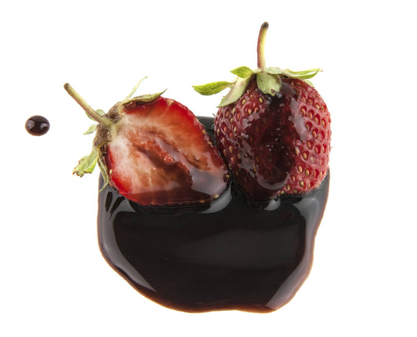 Strawberry in chocolate isolated on white background - Photo, Image