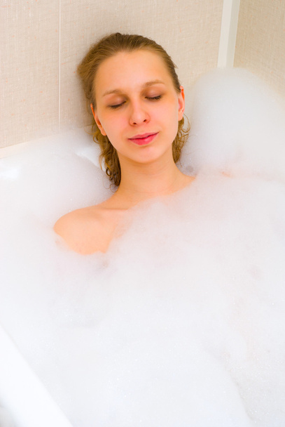 Girl in bath foam - Foto, Bild