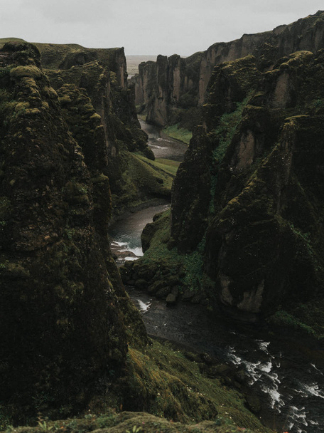 mountain river between giant cliffs - Fotografie, Obrázek