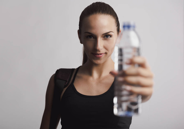  woman holding a water bottle - 写真・画像