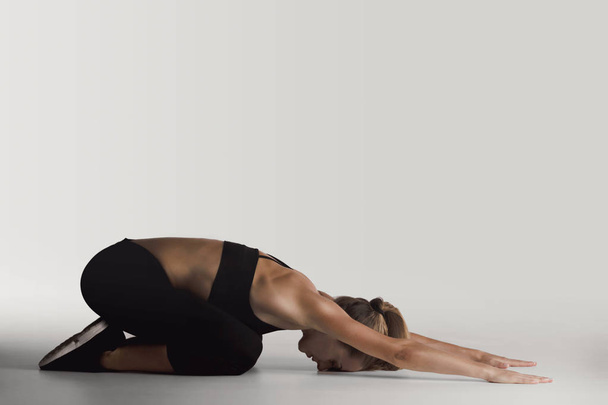 woman doing stretching exercises  - Valokuva, kuva