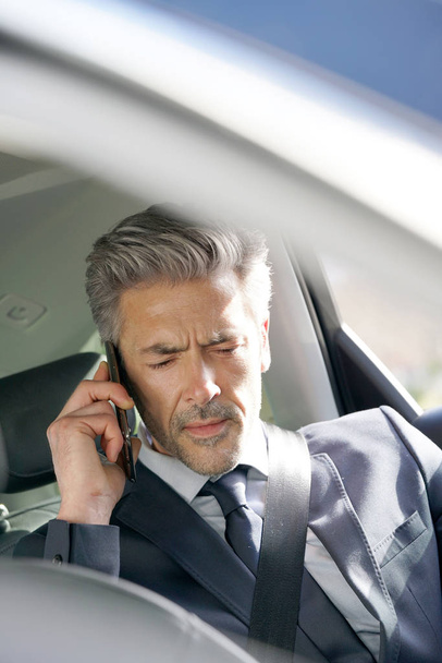 Businessman talking on phone  - Φωτογραφία, εικόνα