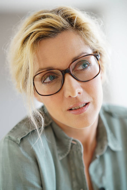  blond woman with eyeglasses - Photo, image