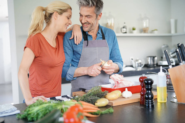 couple having fun cooking together  - 写真・画像